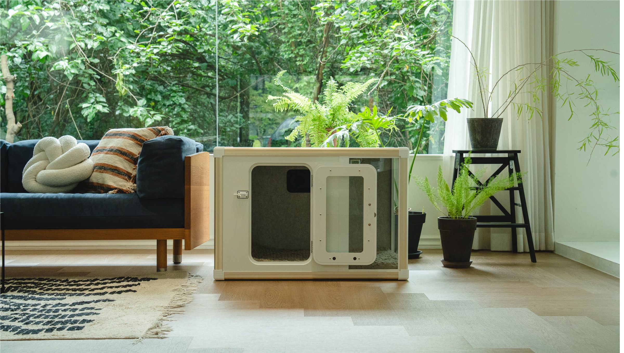 Tailody Mute Square soundproof pet house in a bright living room